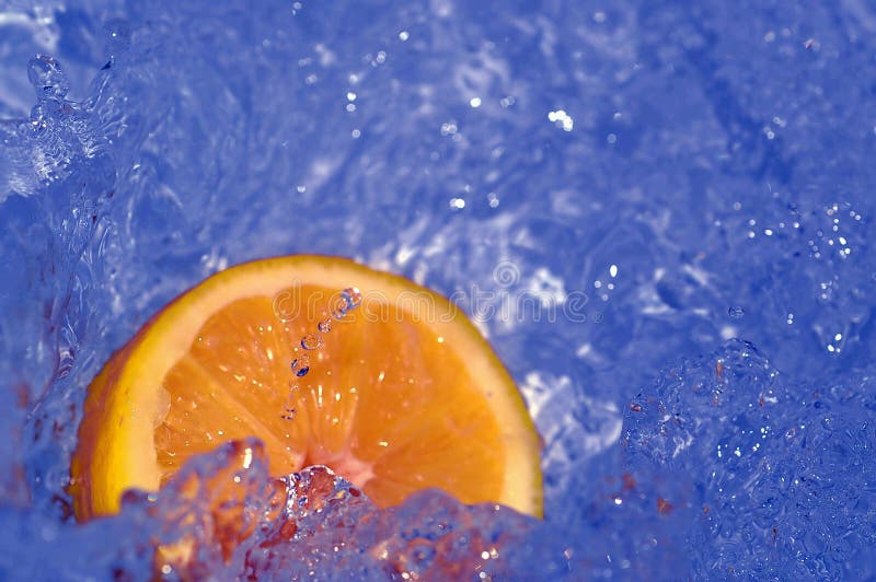 Fresh orange in water