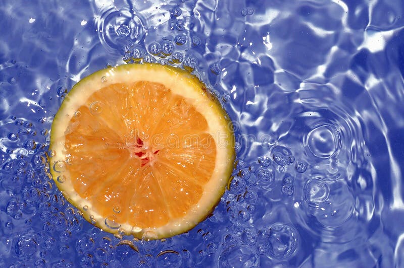 Orange splashing water stock photo. Image of alcohol, drink 700270