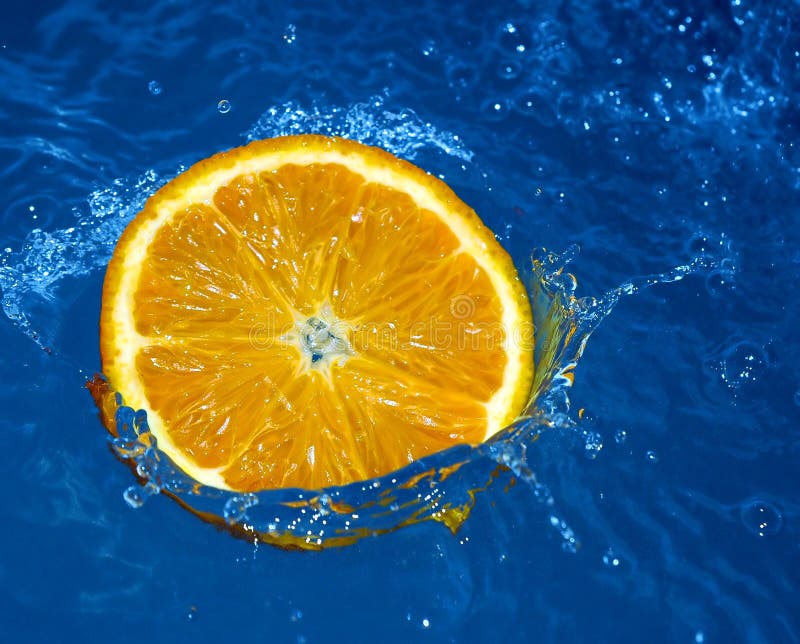 Fresh orange in water