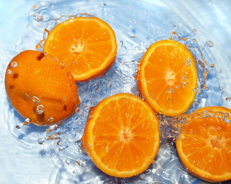 Fresh orange in water