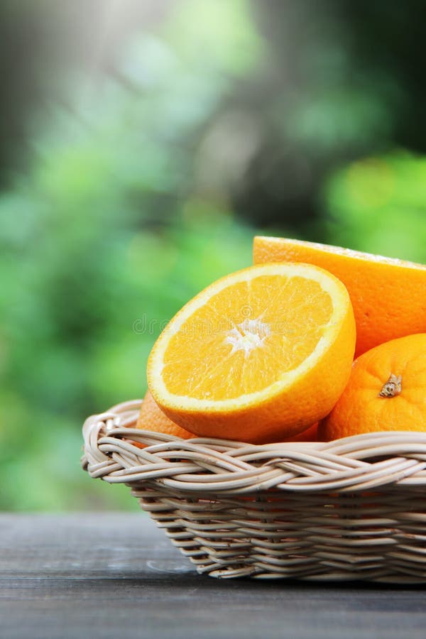 Oranges Fruit Slice in Basket on Wooden Table. Stock Photo Image of