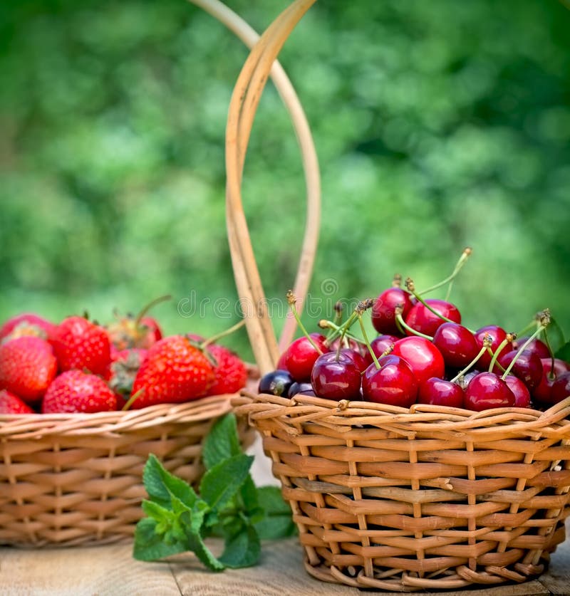 Cherries And Strawberries In Baskets Stock Image Image of organic