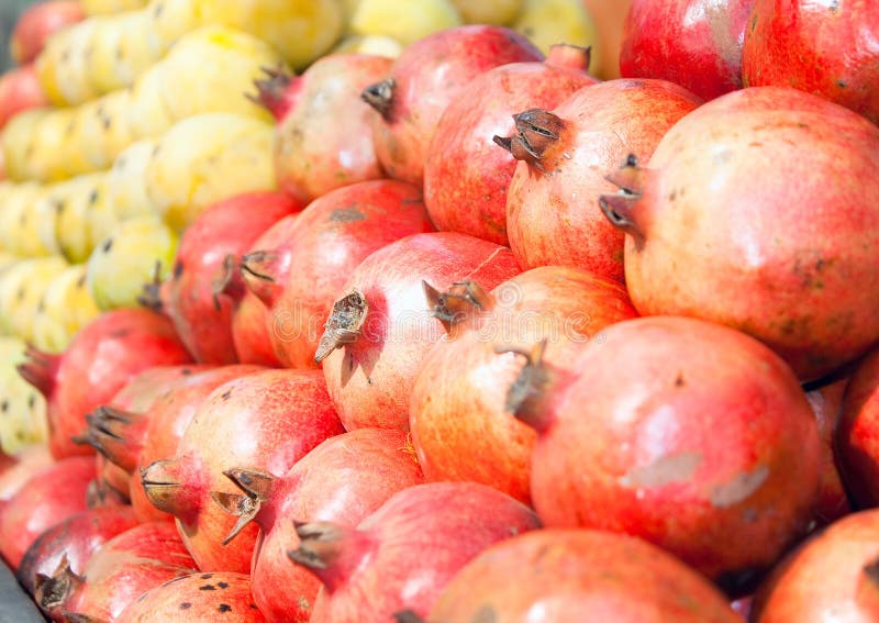 Fresh organic pomegranate for sale at a market