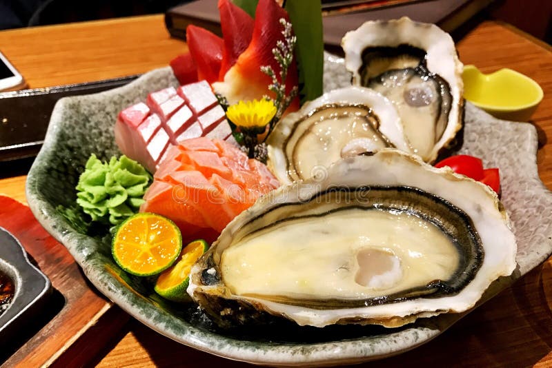 Oyster Sashimi stock image. Image of seafood, lunch, lemon 23496937