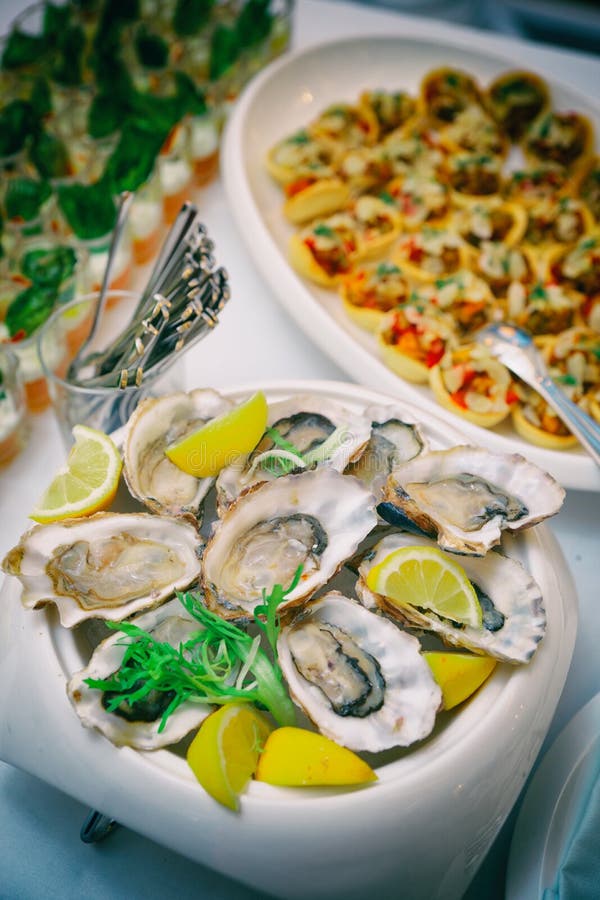 Fresh Oysters on Plate with Lemon Stock Image Image of restaurant