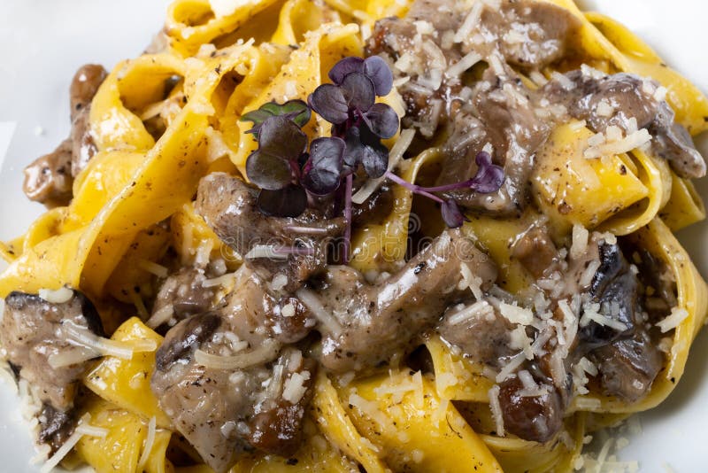 Fresh Pappardelle Pasta with Porcini Mushrooms and Truffle Scent