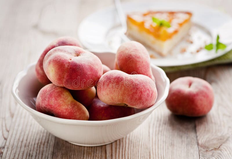 Peaches in a bowl stock photo. Image of freshness, fruit 121985314