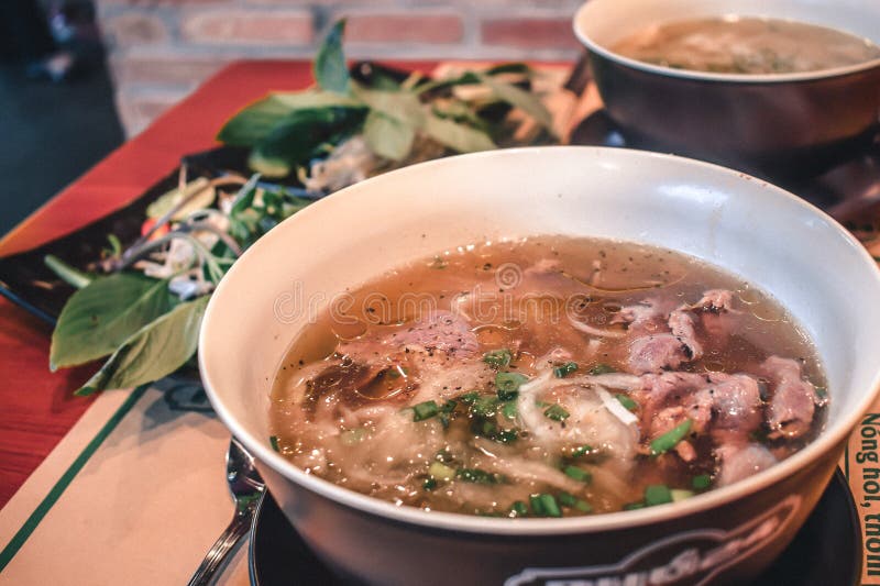 Fresh Pho Bo beef soup in a bowl in Saigon Vietnam