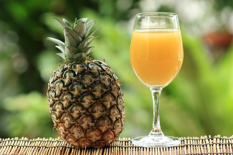Fresh pineapple and juice stock photo. Image of fruit 35618854