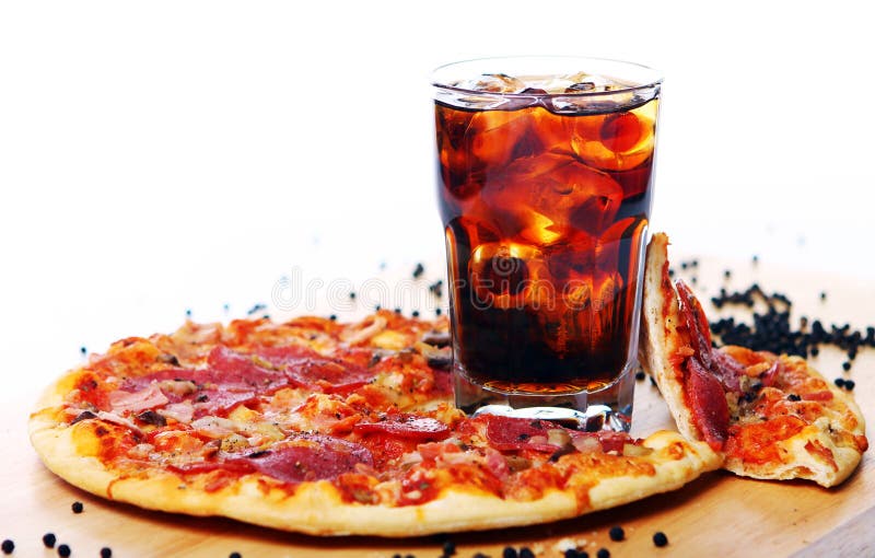 Fresh pizza and cold cola drink