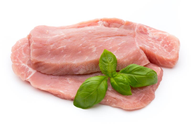 Fresh pork fillet with basil on a white background. royalty free stock images Fresh pork fillet with basil on a white background. royalty free stock images