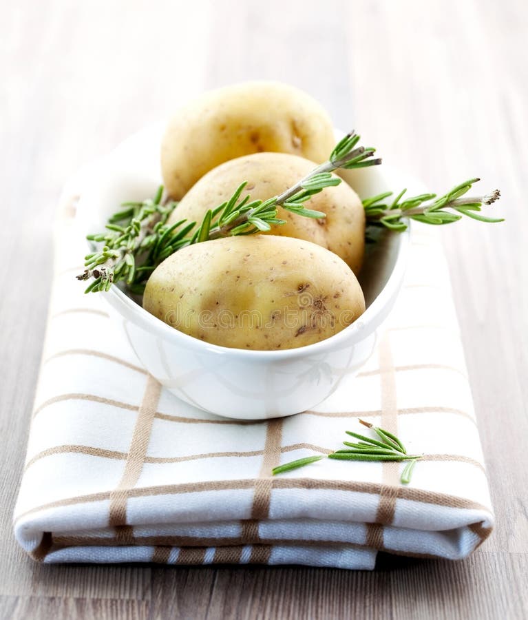 Fresh potato and fresh rosemary