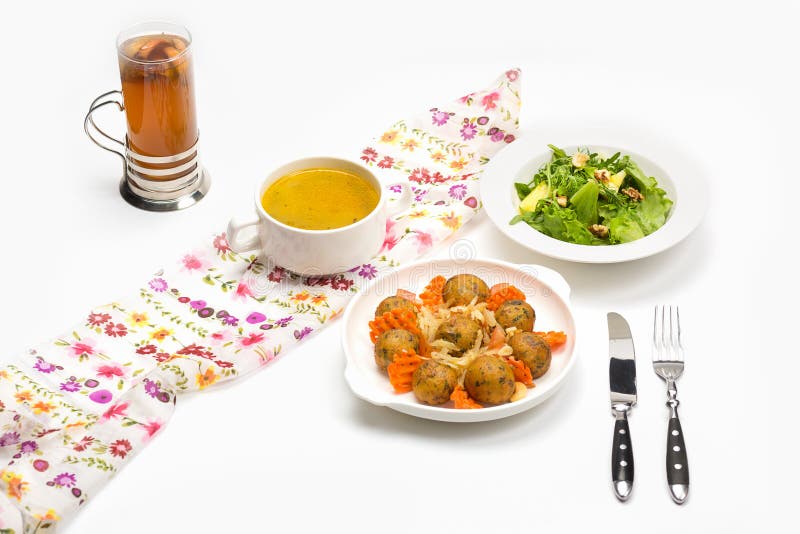 Fresh pumpkin cream soup and salad stock photos Fresh pumpkin cream soup and salad stock photos