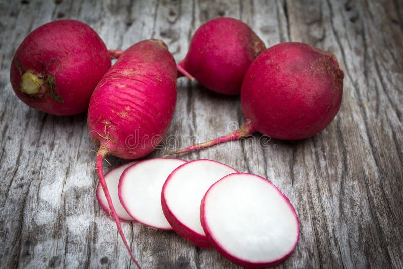 Fresh radish on old wooden