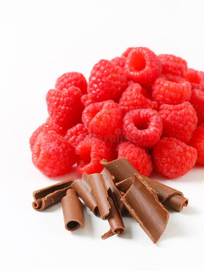 Fresh raspberries and chocolate curls stock photo