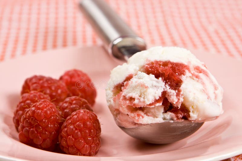 Fresh raspberries with ice cream