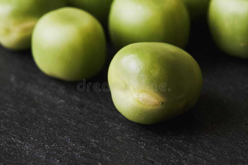 Fresh raw green peas stock photo. Image of produce, pile 117634304