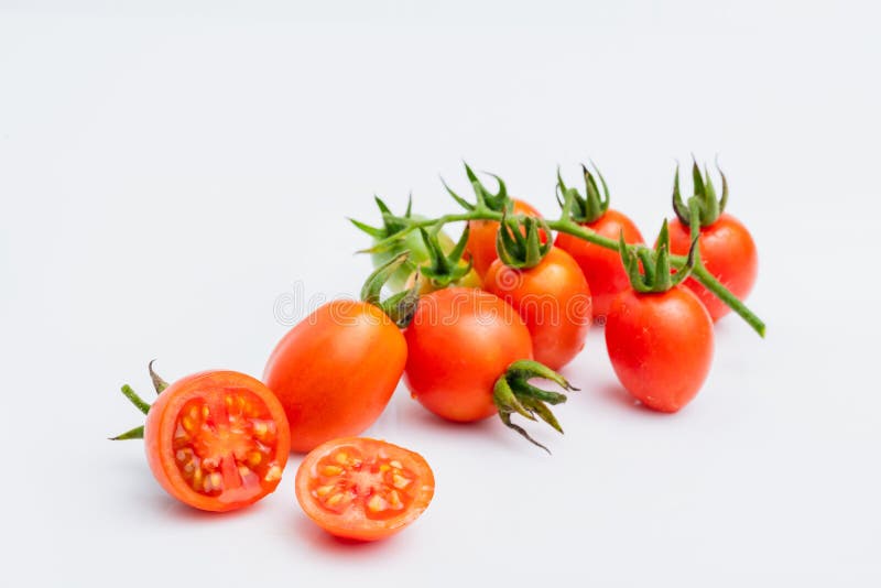 fresh red cherry tomatoes &x28;grape tomatoes &x29; on white background