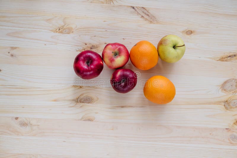 Fresh Red and Green Apple, Orange on Wooden Decks. Stock Photo - Image
