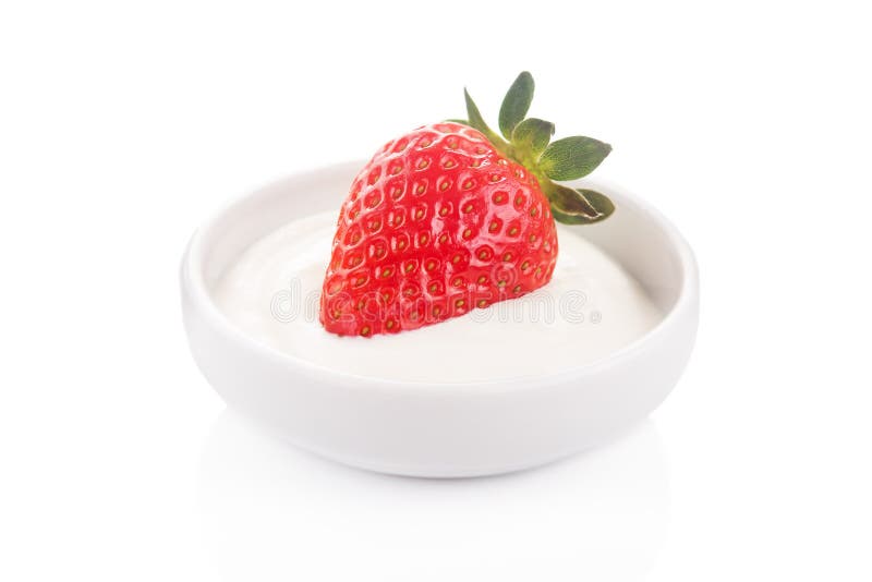Fresh red strawberry in bowl with tasty sour cream