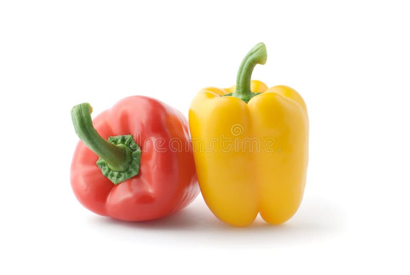 Fresh red and yellow peppers close-up