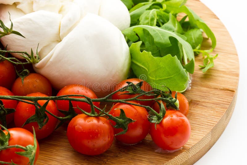 Fresh salad with cherry tomatoes, rucola, mozzarella