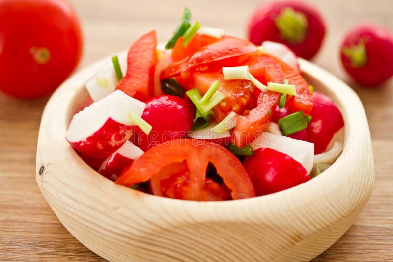 Fresh salad of radish and tomatoes