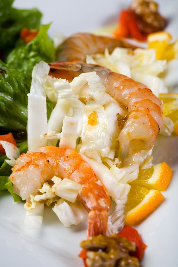Fresh salad with shrimps stock images