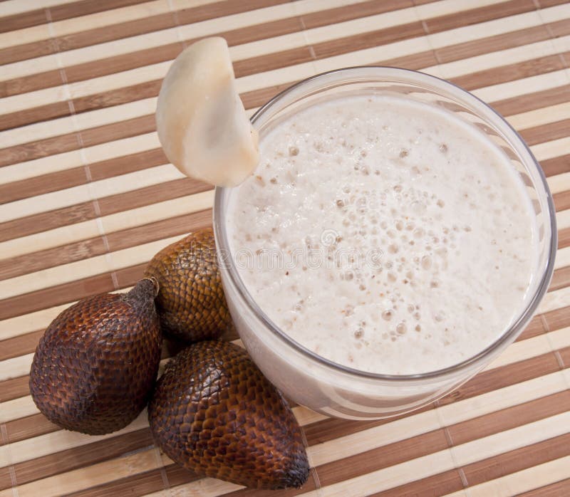 Fresh salak snake fruite smoothy royalty free stock images