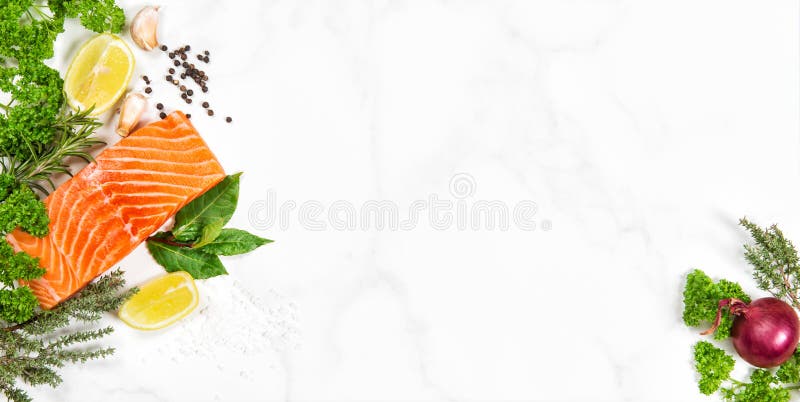 Fresh salmon fish fillet with aromatic herbs and spices