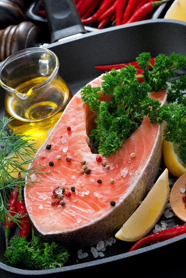 Fresh Salmon Steak and Ingredients for Cooking on a Grill Pan Stock