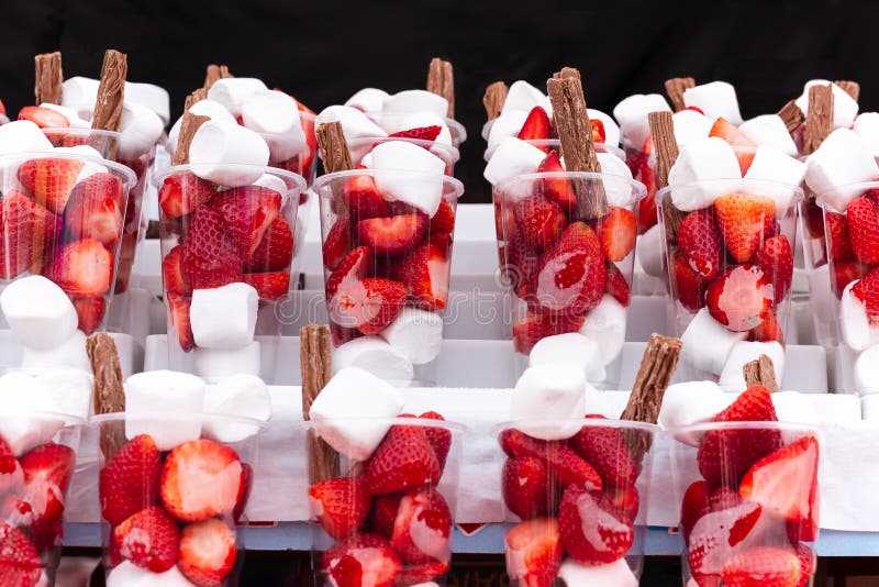 Fresh Strawberries with Marshmallow and Chocolate Stick in Plastic Cup