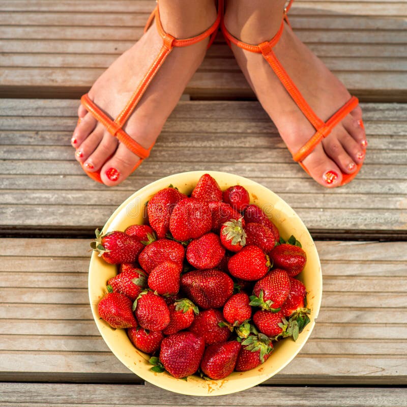 Fresh strawberry in the yellow plate