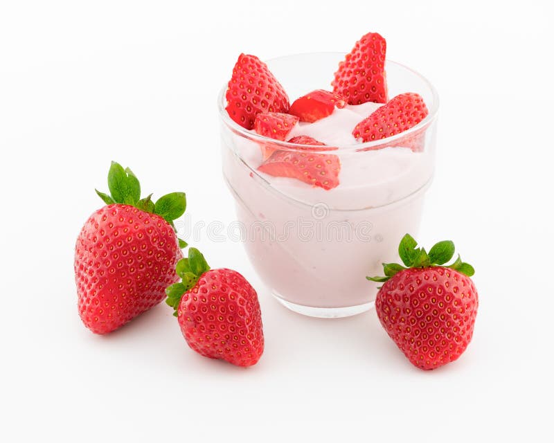 Fresh strawberry with yogurt in a glass isolated