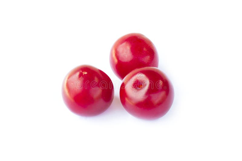Fresh sweet cherry plums fruit, three juicy ripe red cherry-plums, closeup, isolated on the white background royalty free stock photography Fresh sweet cherry plums fruit, three juicy ripe red cherry-plums, closeup, isolated on the white background royalty free stock photography