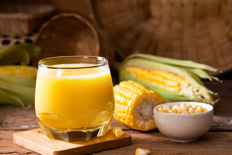 Fresh Sweet Corn Juice (corn Milk) and Corn on Wood Background Stock ...