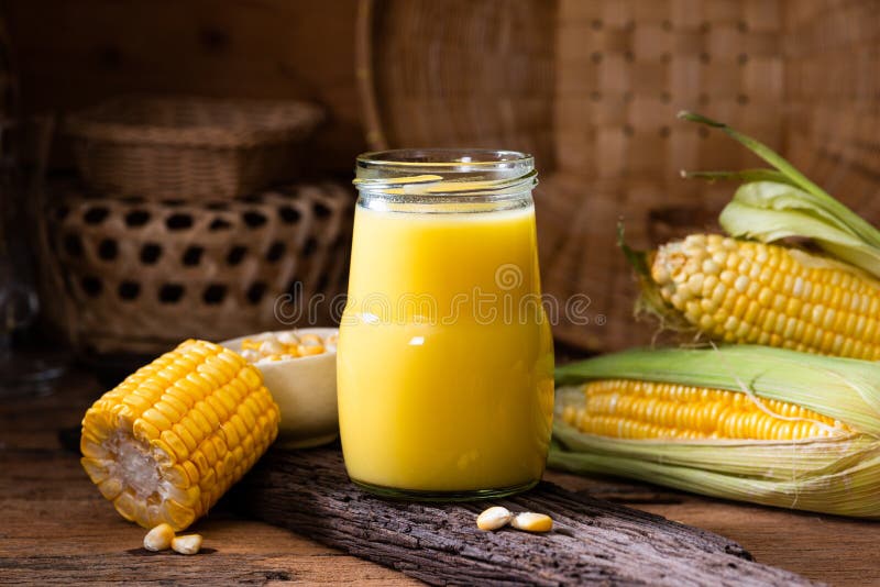 Fresh Sweet Corn Juice (corn Milk) and Corn on Wood Background Stock ...