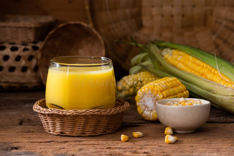 Juice corn in hand stock image. Image of food, agriculture - 226646003