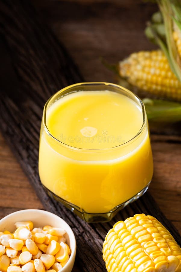 Juice corn in hand stock image. Image of food, agriculture - 226646003