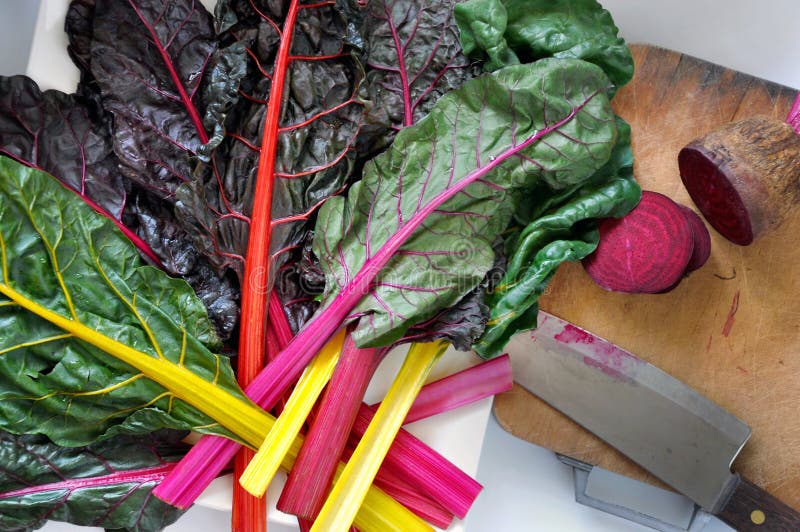 Fresh Swiss Chard and Beetroot on Cutting Board