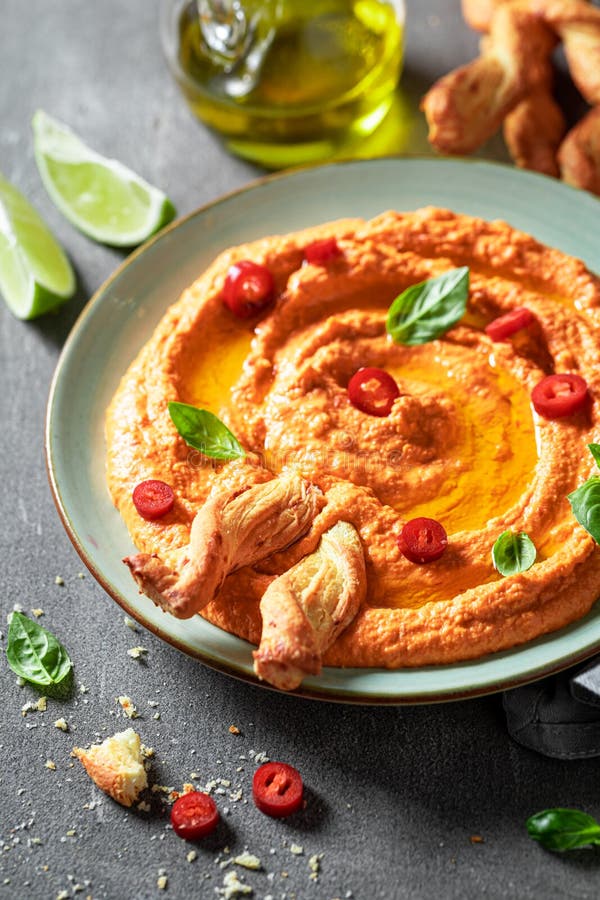 Fresh Tomato Hummus with Breadsticks and Basil Stock Image Image of