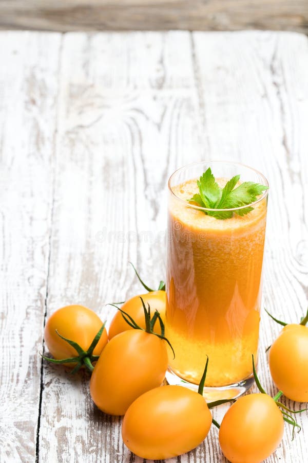 Fresh Tomato Juice Made from the Goldenyellow Tomatoes Stock Photo