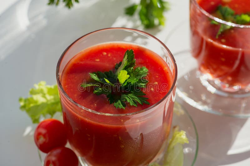 Fresh Tomato Juice with Tomatoes and Greens. Stock Photo Image of
