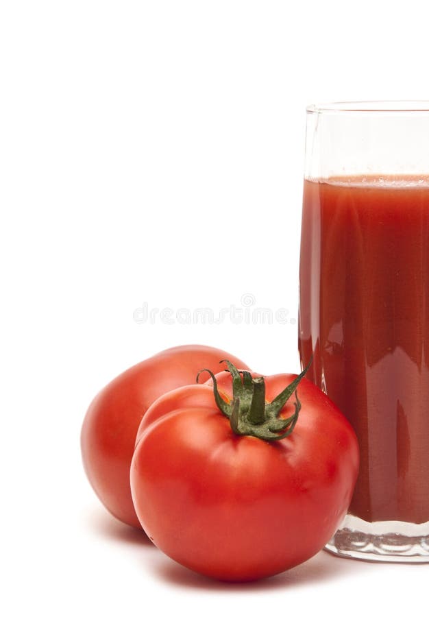 Fresh tomatoes and a glass full of tomato juice