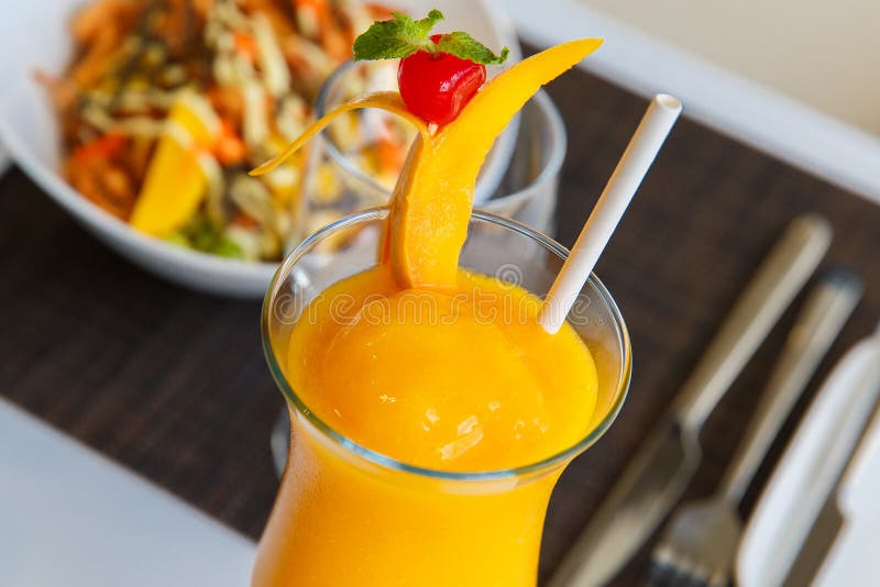 Fresh Tropical Fruit Smoothie Mango Juice on Restaurant. Mango Shake
