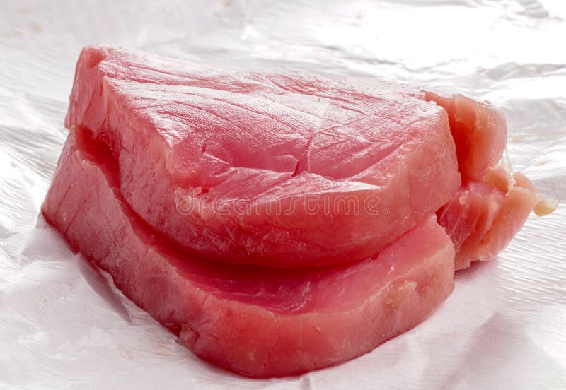 Fresh Tuna Fish steak stock photo. Image of uncooked 57051606