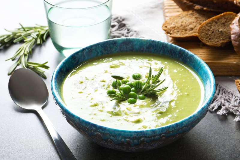 Fresh Vegetable Detox Soup Made of Green Peas in Dish Served Stock