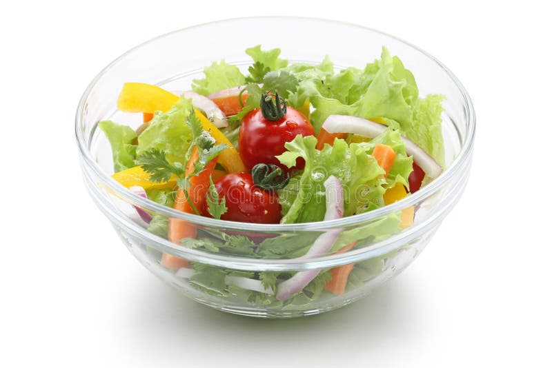 Fresh vegetable salad on white background