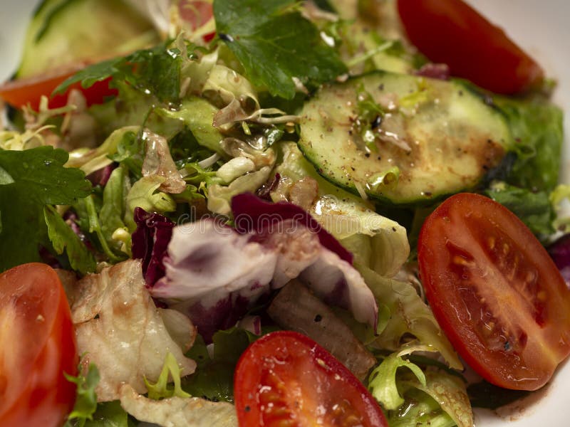 Fresh Vegetable Salad Dressed with Olive Oil and Balsamic Vinegar Stock