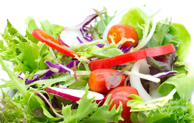 Fresh vegetable salad isolated on white.